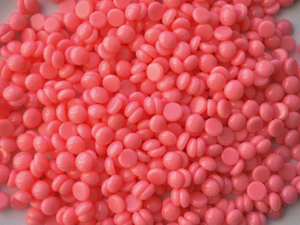 A close-up shot of smooth, hair-free skin after a professional waxing session, highlighting the refined skin texture and cleanliness. Focus on the soft lighting and healthy glow of the skin.