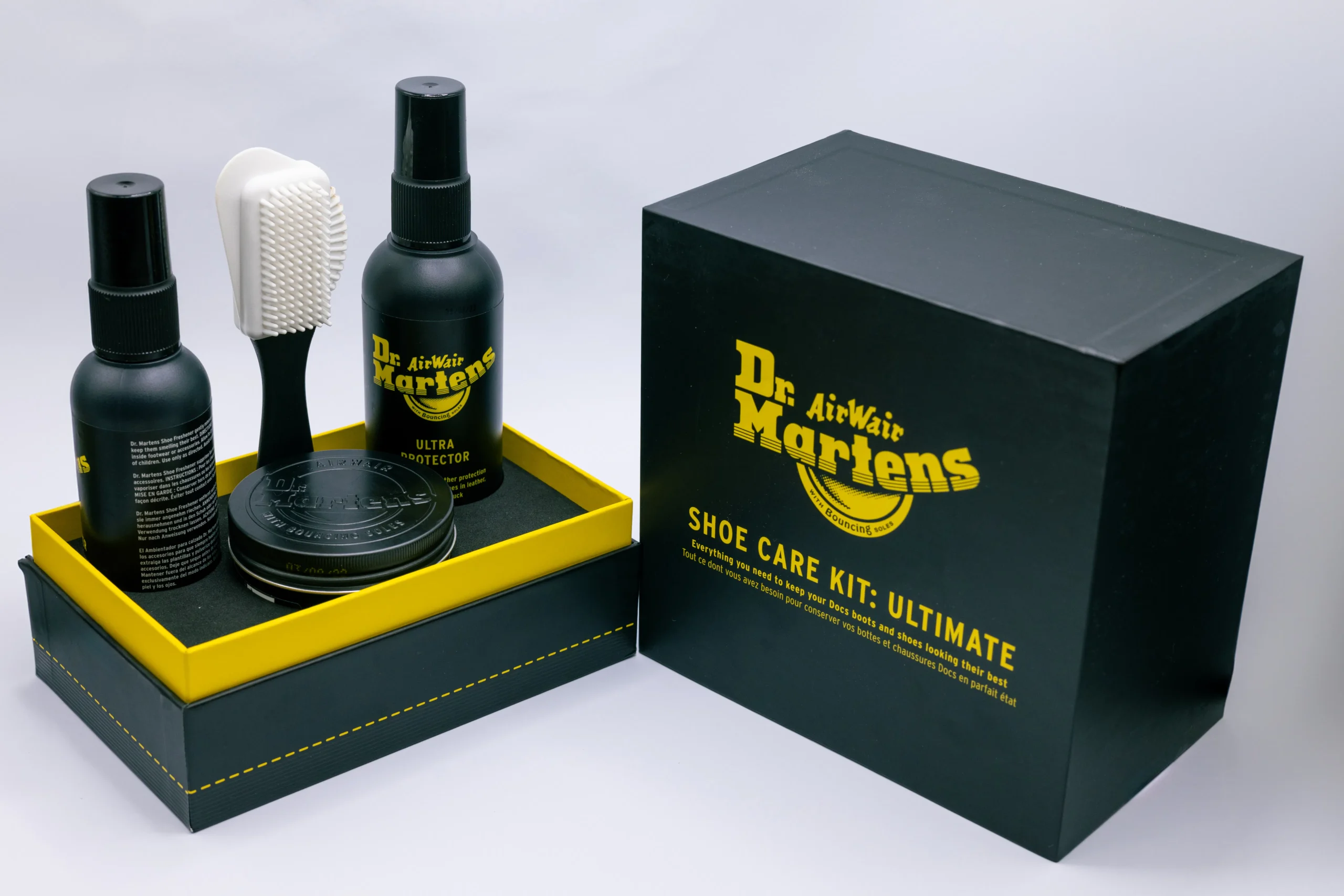 A collection of post-wax care products, such as soothing lotions, exfoliating scrubs, and hydrating oils, arranged to showcase a post-wax care routine for maintaining smooth legs.