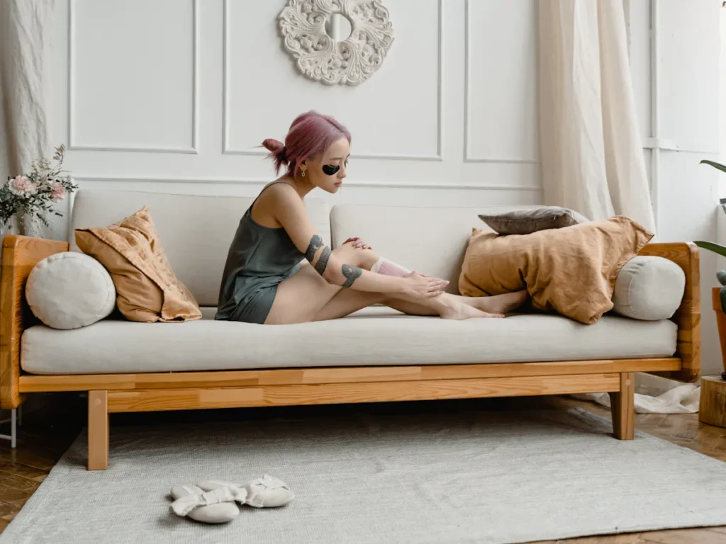 A person with smooth, freshly waxed legs, highlighting the concept of at-home leg waxing. The image should convey simplicity, effectiveness, and affordability.