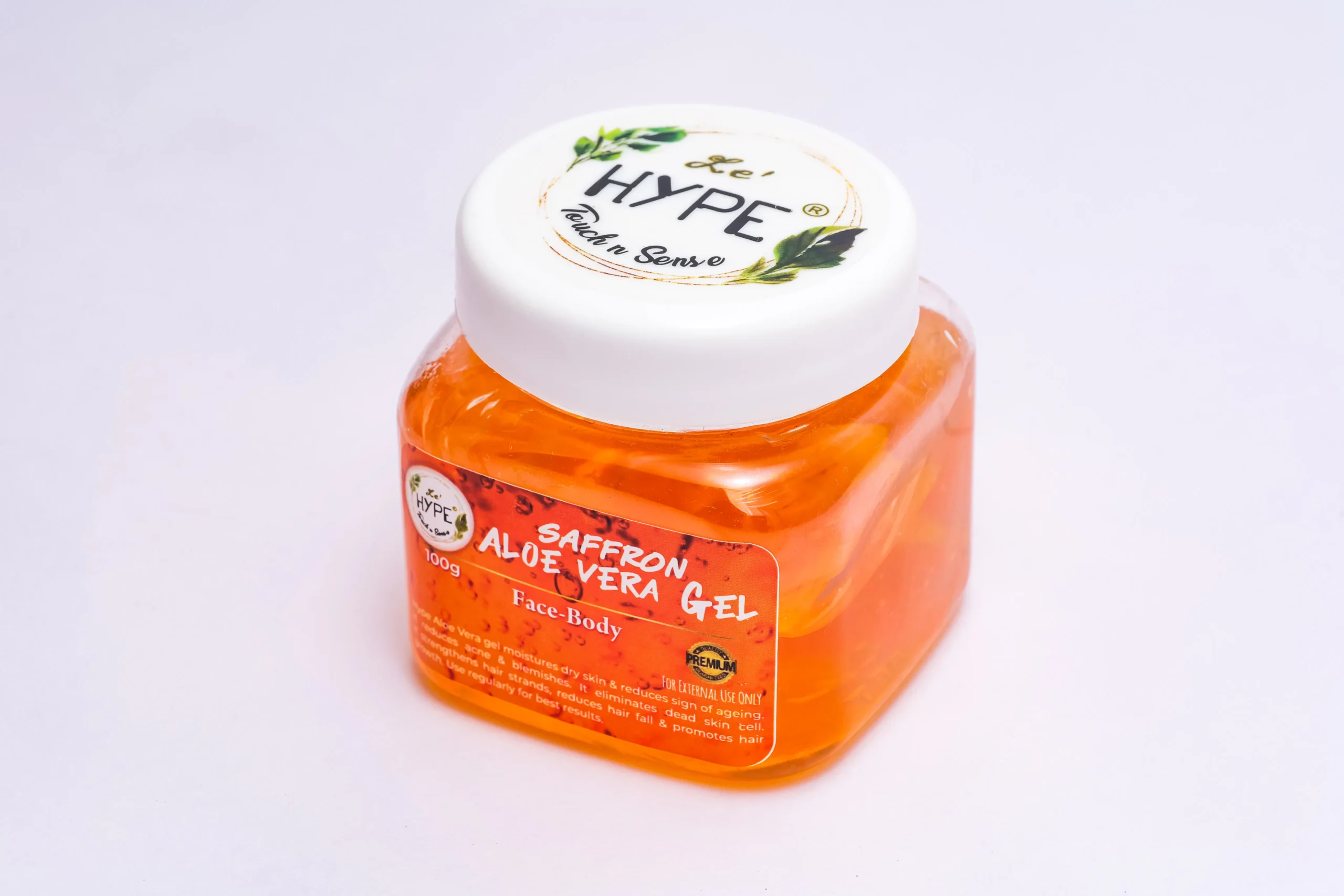 A person applying aloe vera gel to their freshly waxed arm, gently soothing the skin.