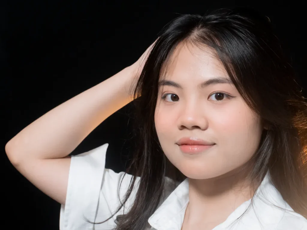 A woman confidently showing off her smooth, freshly waxed legs, symbolizing freedom and self-assurance.