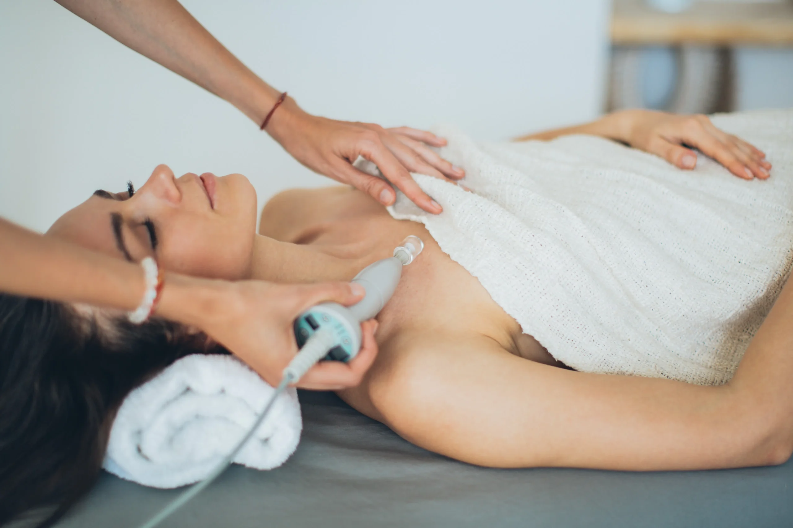 A woman relaxing during her session emphasizing comfort during laser treatment. alt_text: Laser waxing is a pain-free alternative for effective hair removal. img_url: [insert high-quality image URL here]