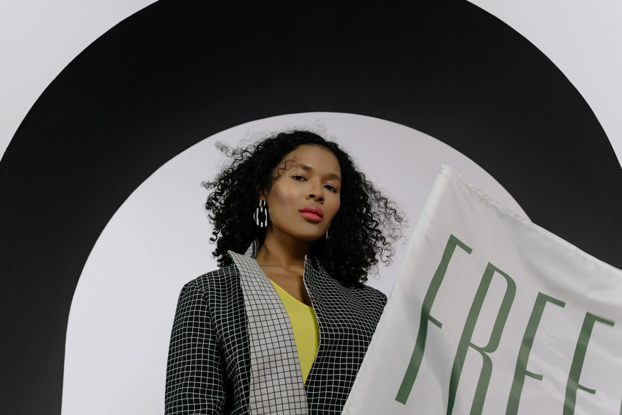 A person smiling confidently, showcasing smooth, hair-free skin after laser waxing.