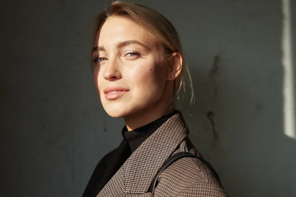 Close-up of a woman with smooth skin, potentially after laser waxing treatment.