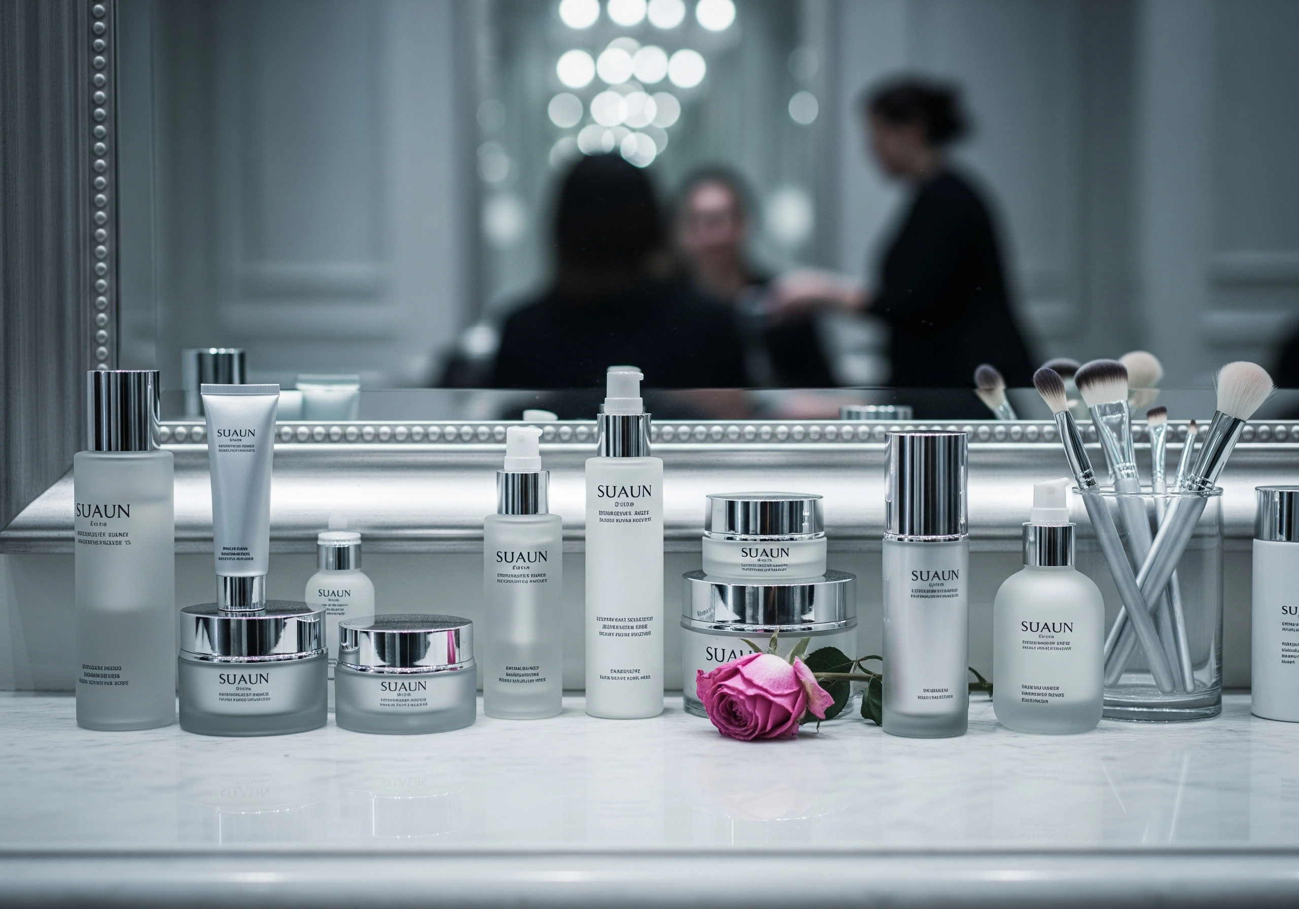 SUAJN skincare products on marble counter in Amsterdam beauty salon, reflected in mirror.