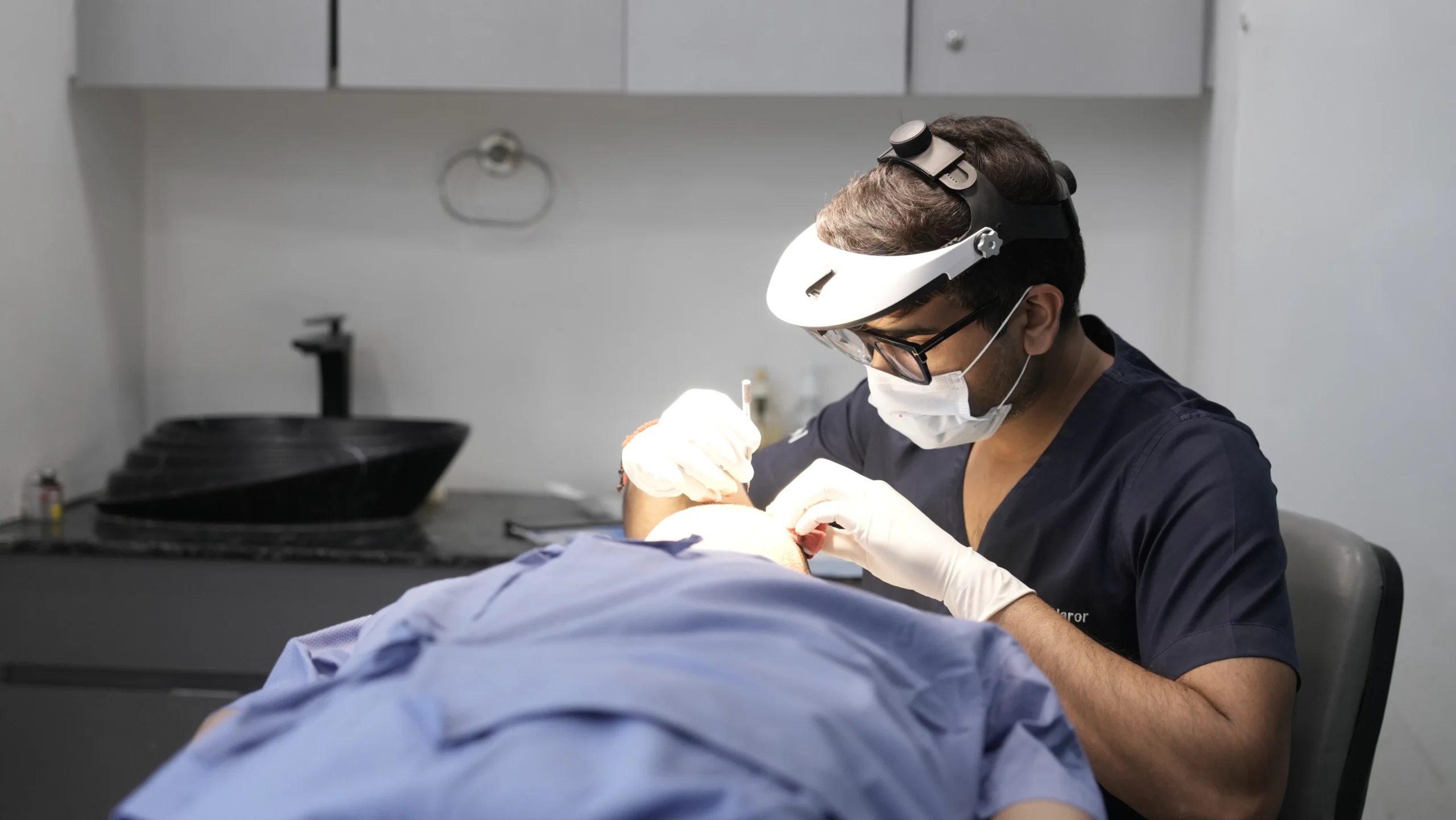 Dermatologist performing a professional skin resurfacing treatment on a patient.