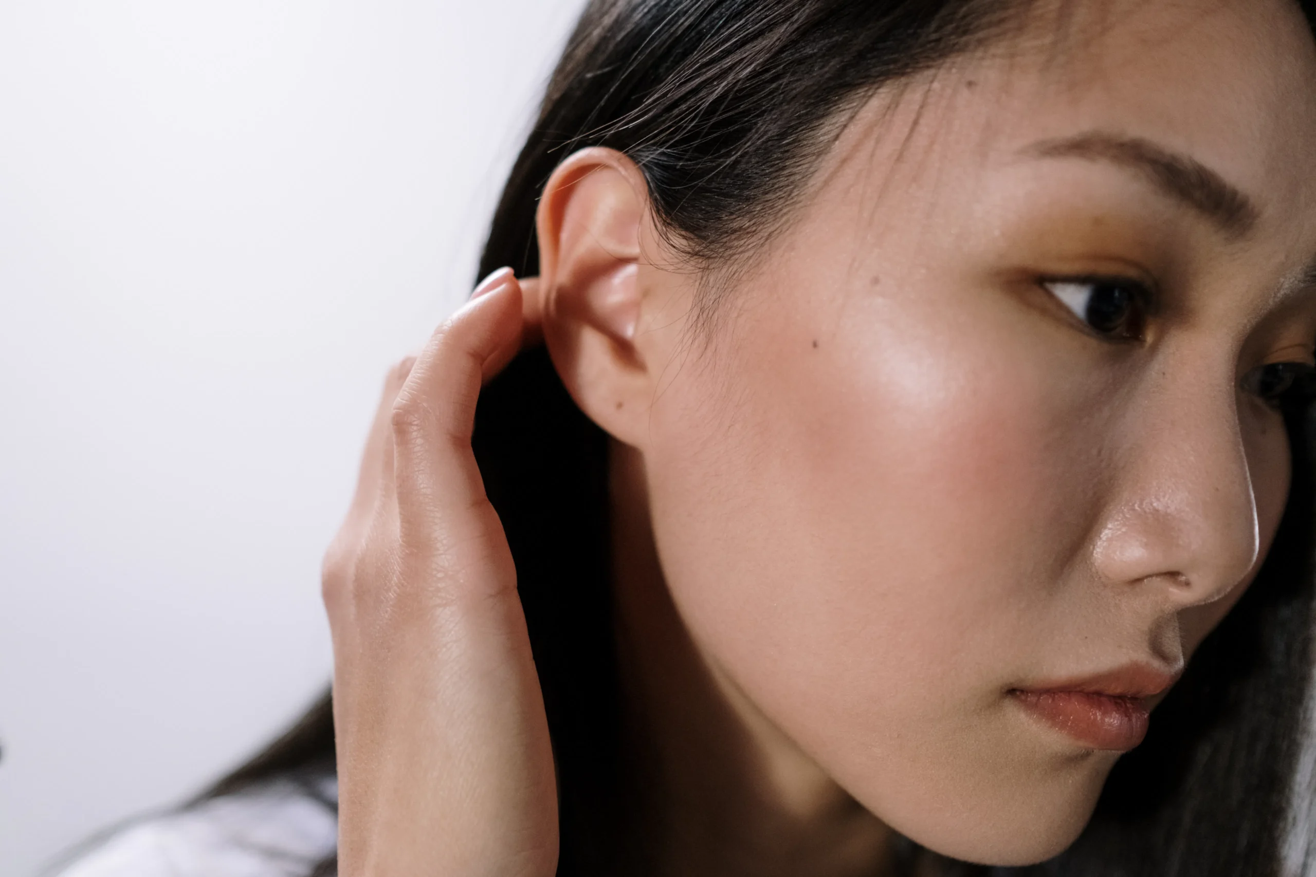 Close-up of woman's face showing clear skin, highlighting Amsterdam beauty secrets